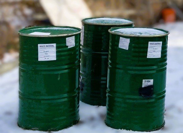 Labelled waste-material drums staged for disposal by Terra Nova